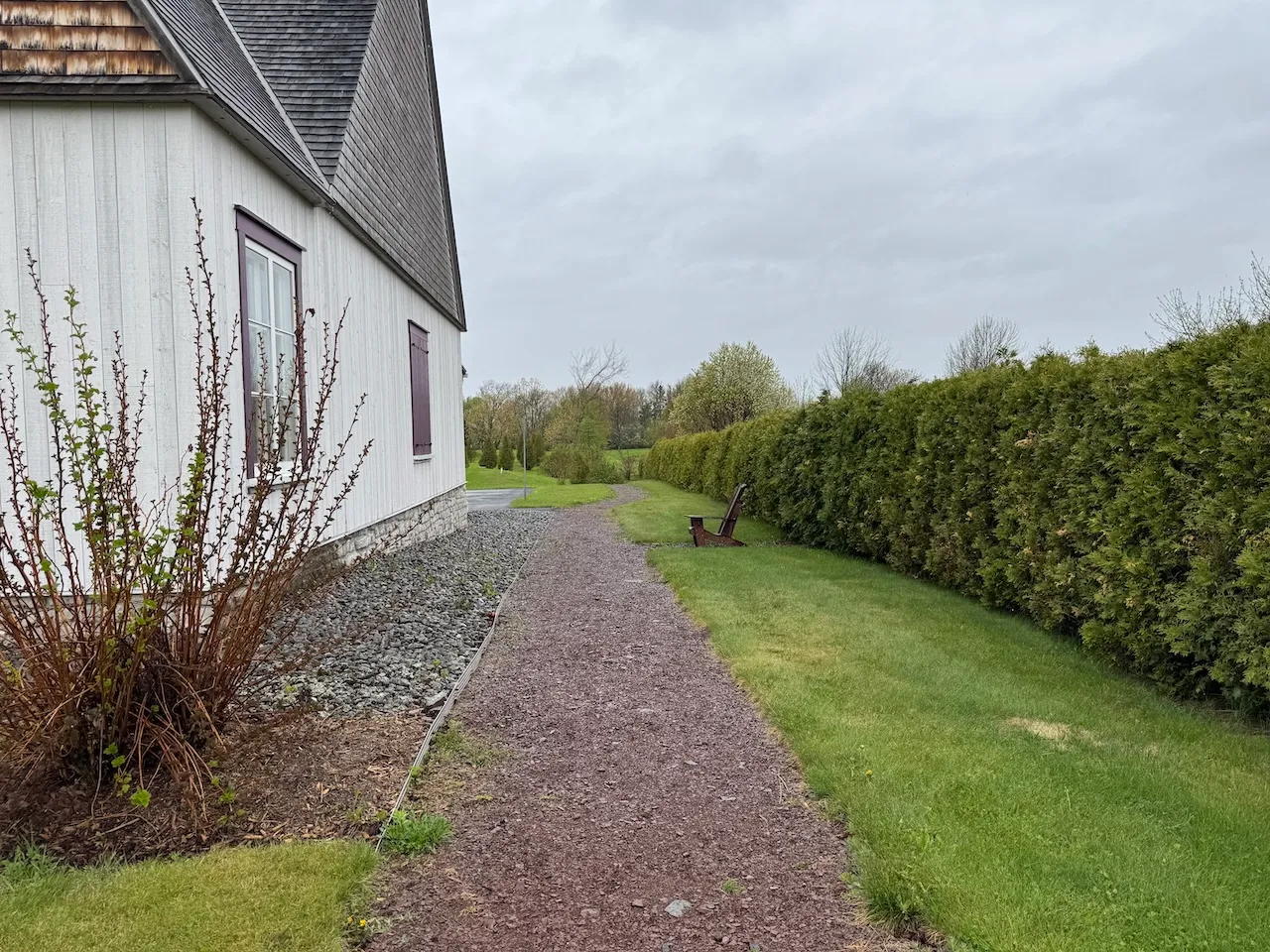 Path leading from the reserved parking area at the entrance