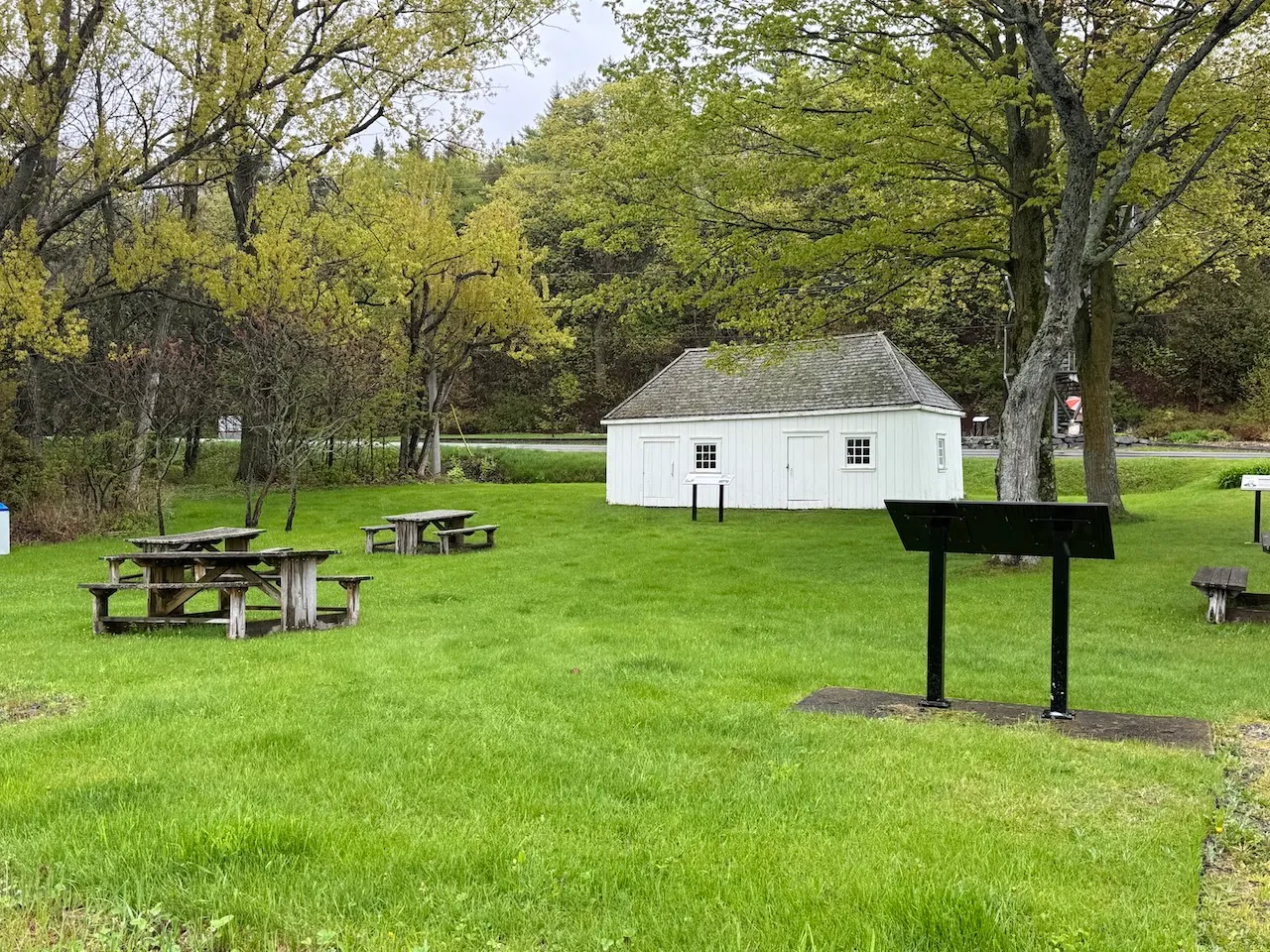 Outdoor building and picnic tables