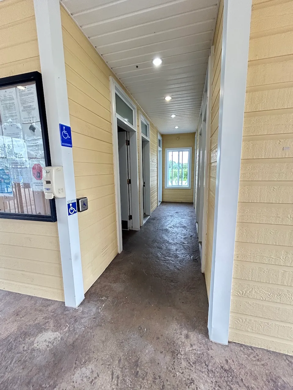 Entrance to the accessible restroom - Pool
