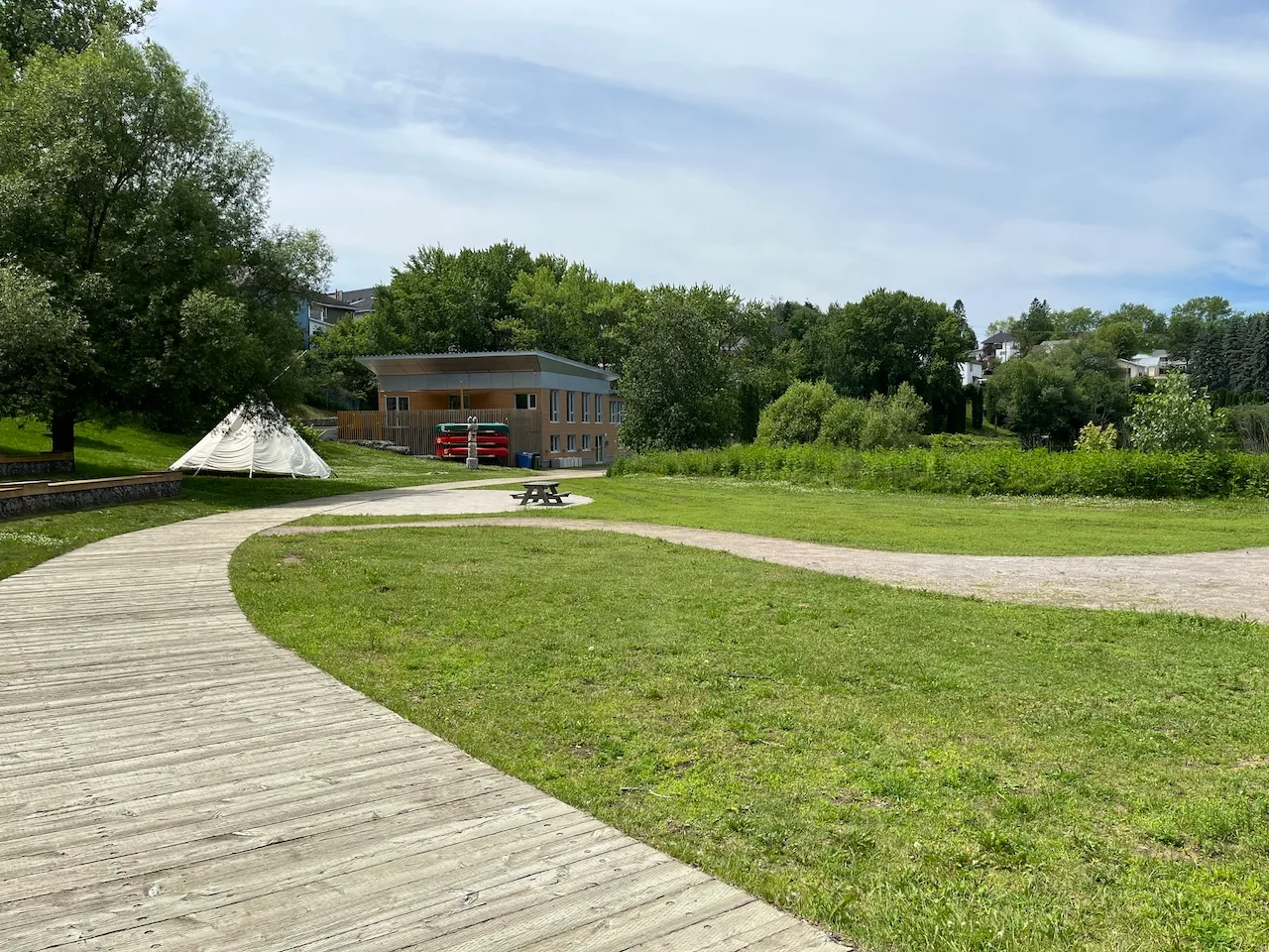 Wooden sidewalk and compacted rock dust path