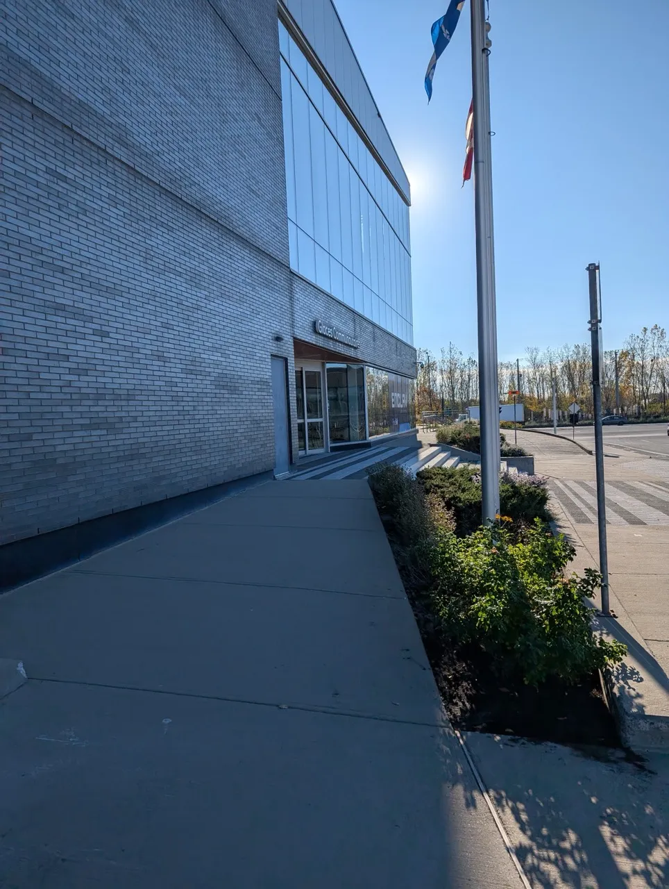 Entrance to l'Enclav, community ice rinks on Boulevard Le Corbusier - access by ramp
