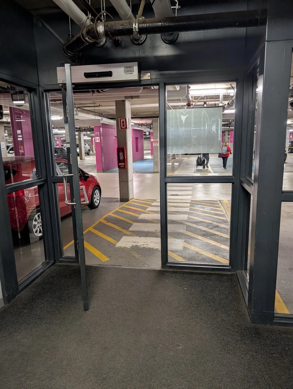 Walkway leading from the elevator to the indoor parking