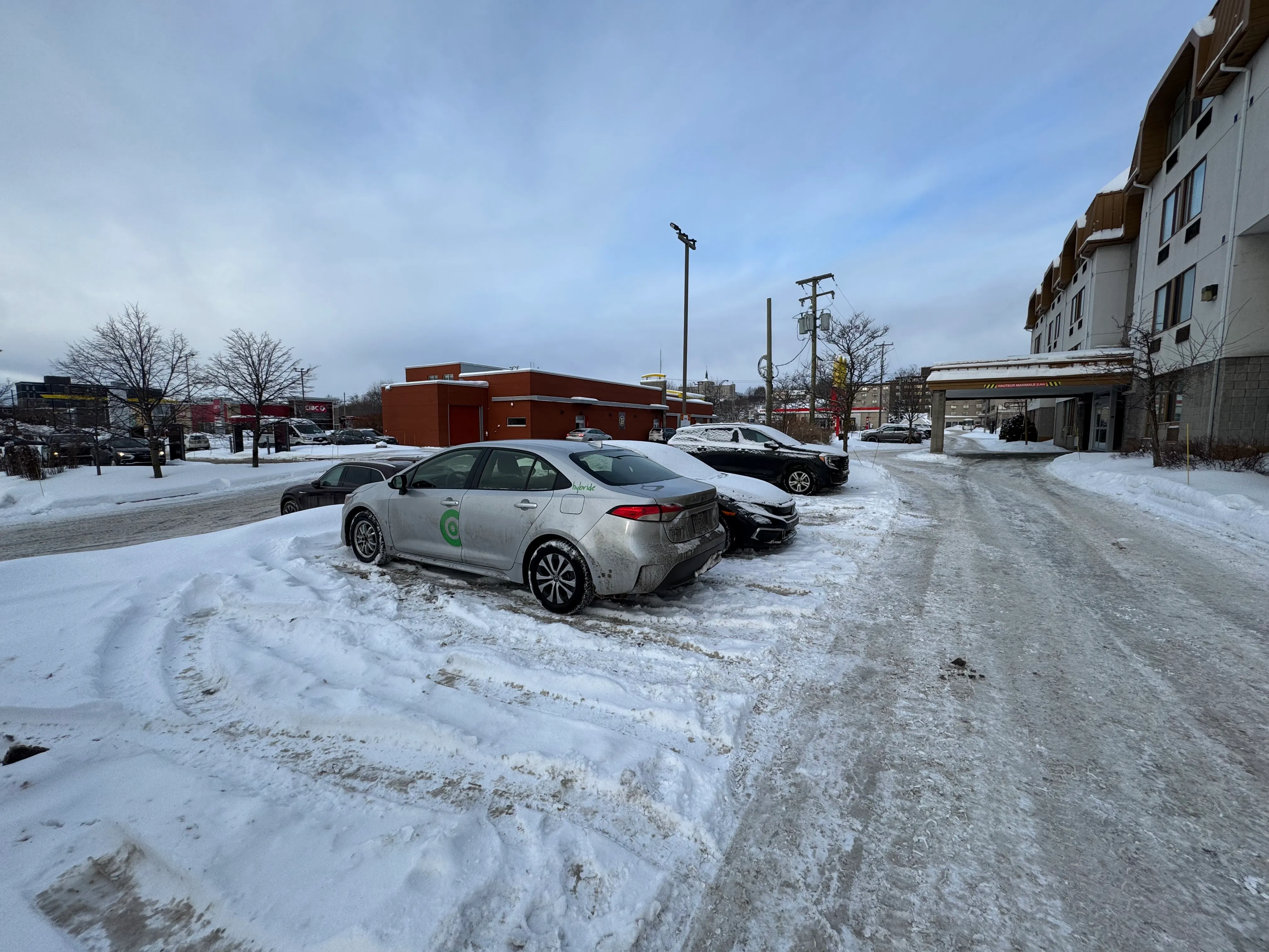 Outdoor parking spaces near the main entrance