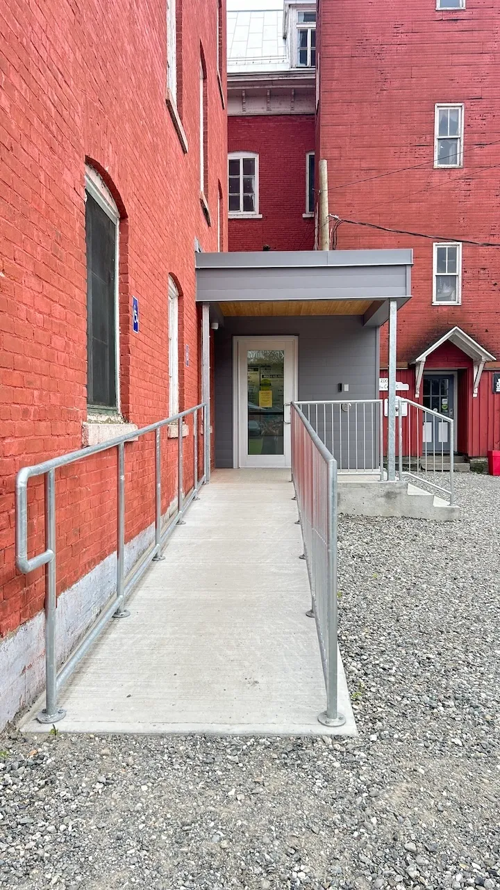 Bottom - Access ramp and entrance door