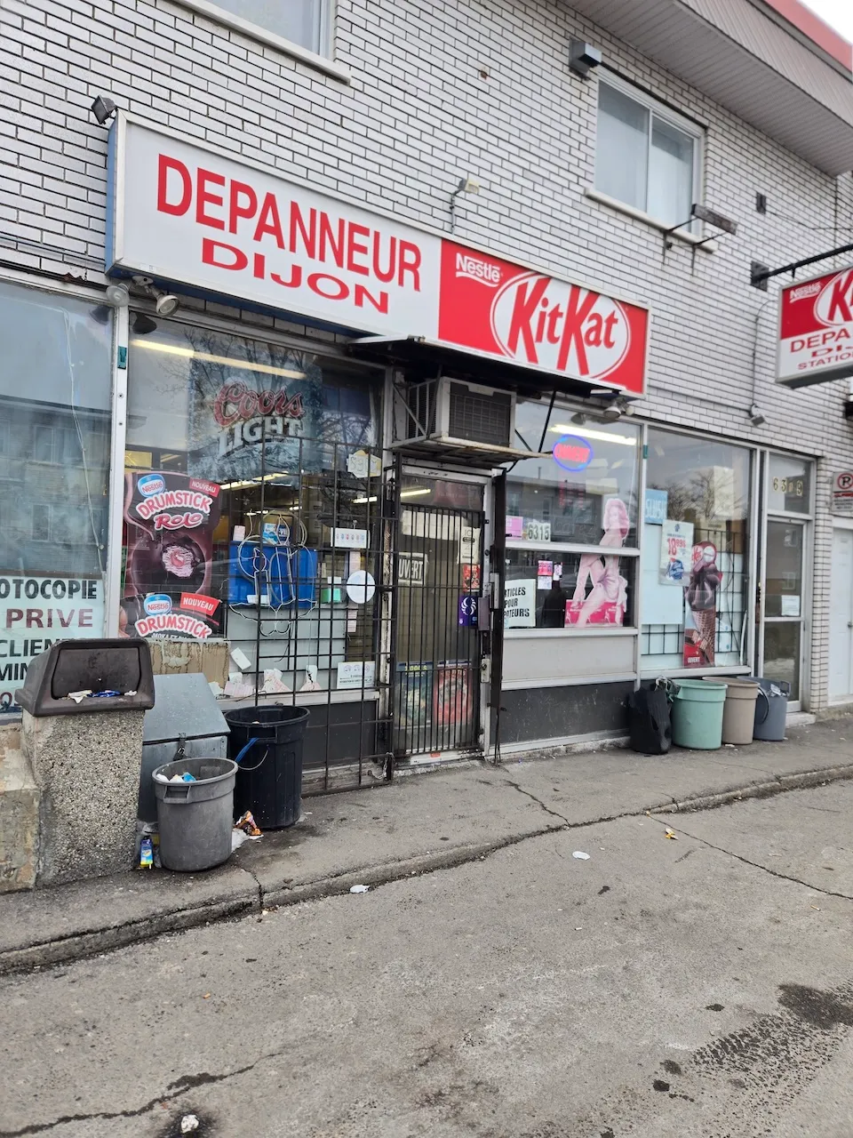 Outdoor entrance to the Dijon convenience store