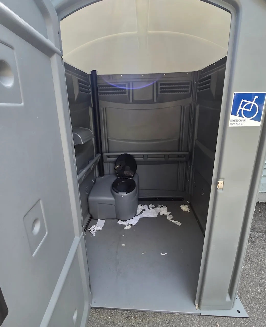 Chemical toilet accessible near the parking lot
