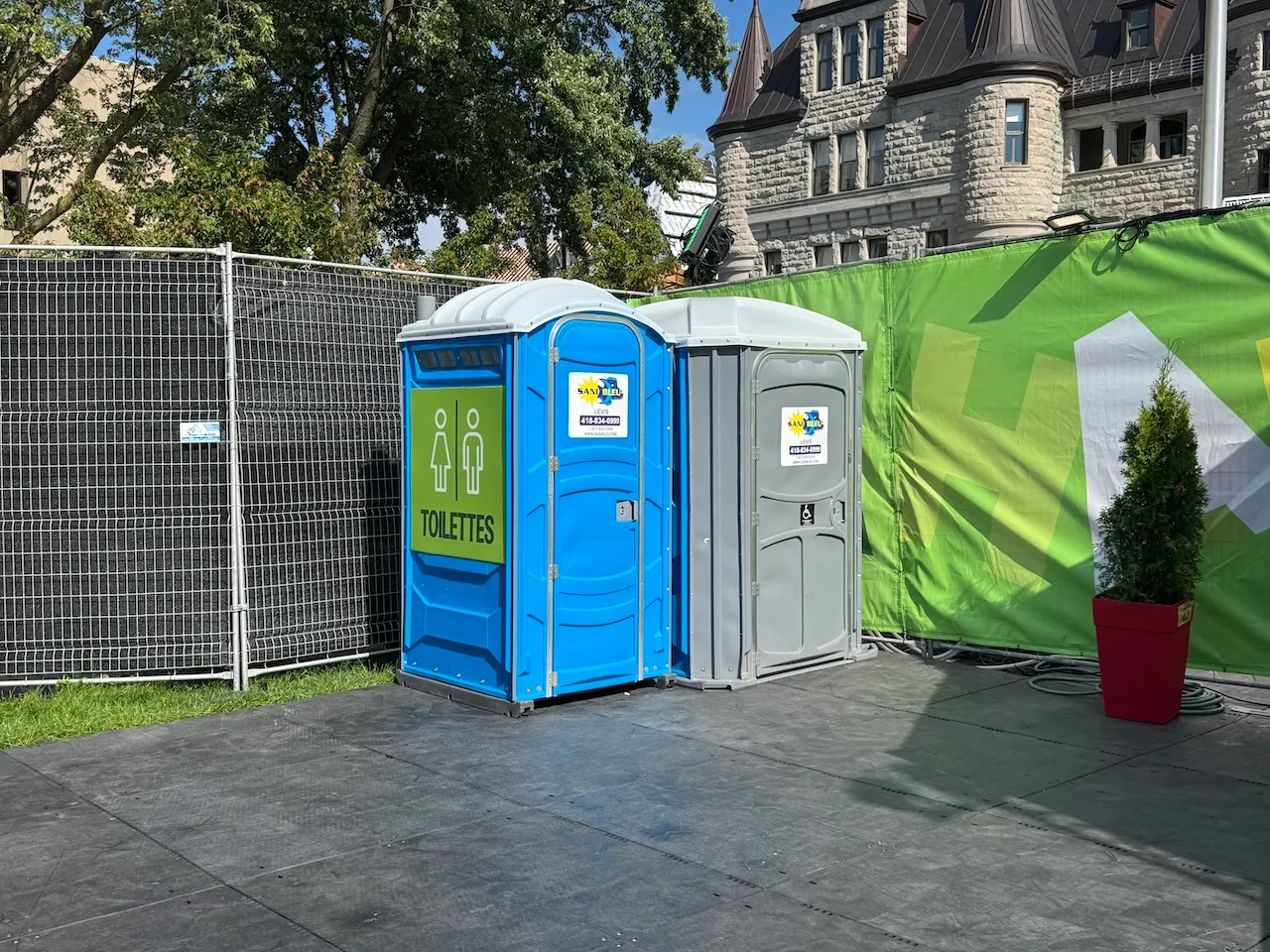 Portable toilets near the VIP lounge