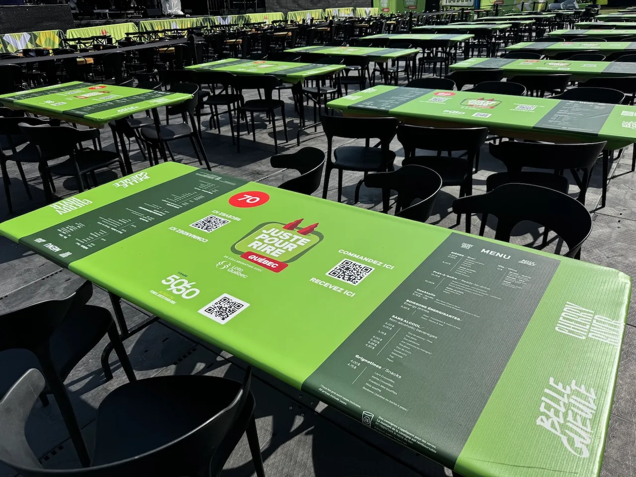 Menus and QR codes on the tables near the stage - Table service