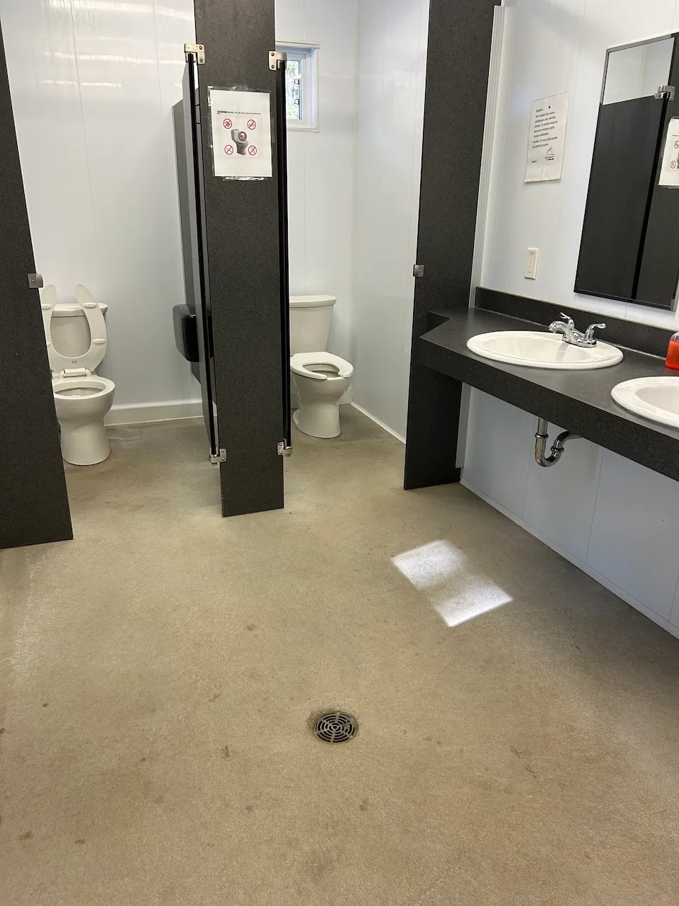 Men's restrooms in the sanitary block