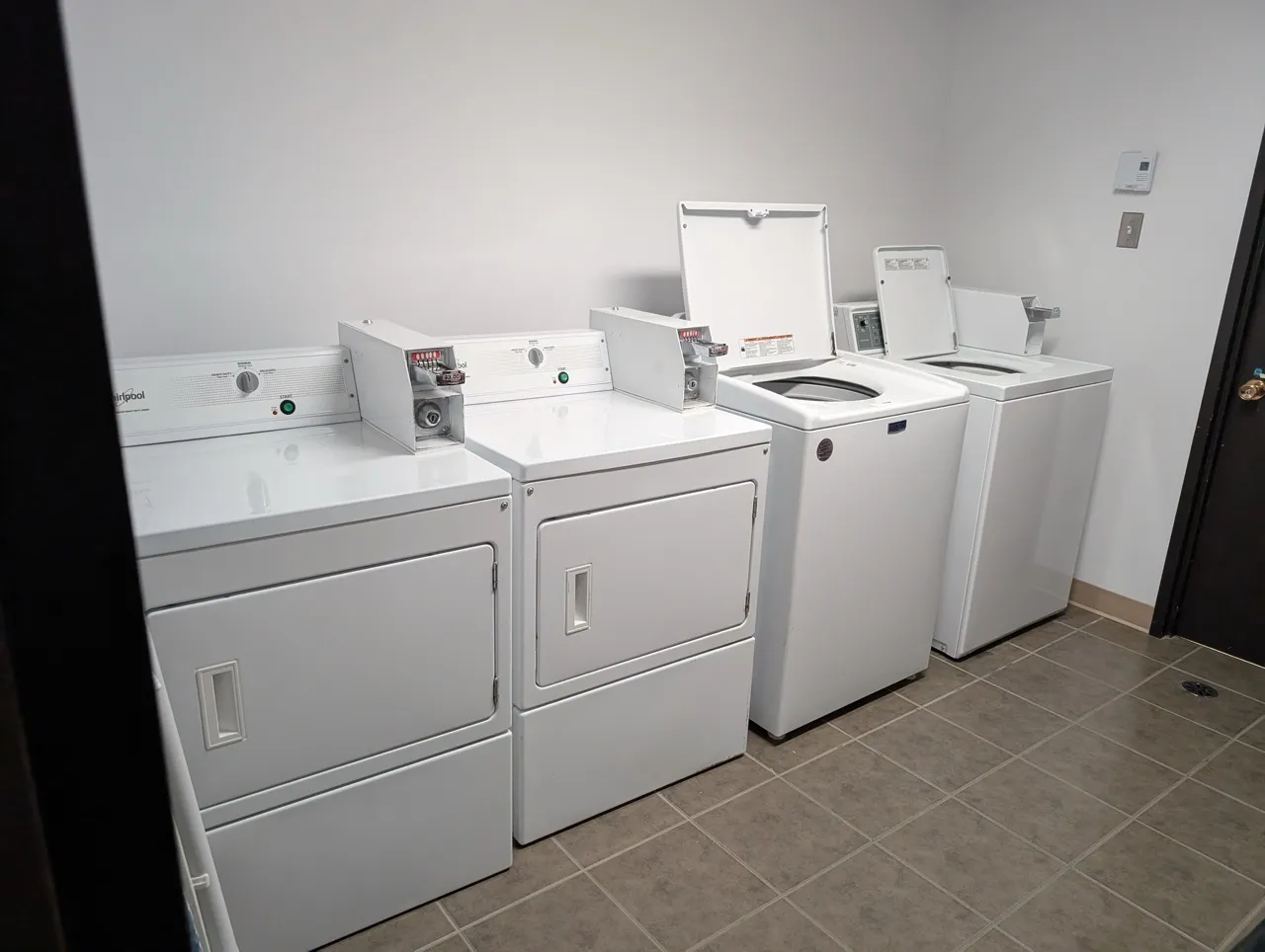 Laundry room available for guests, with 2 washers and 2 dryers
