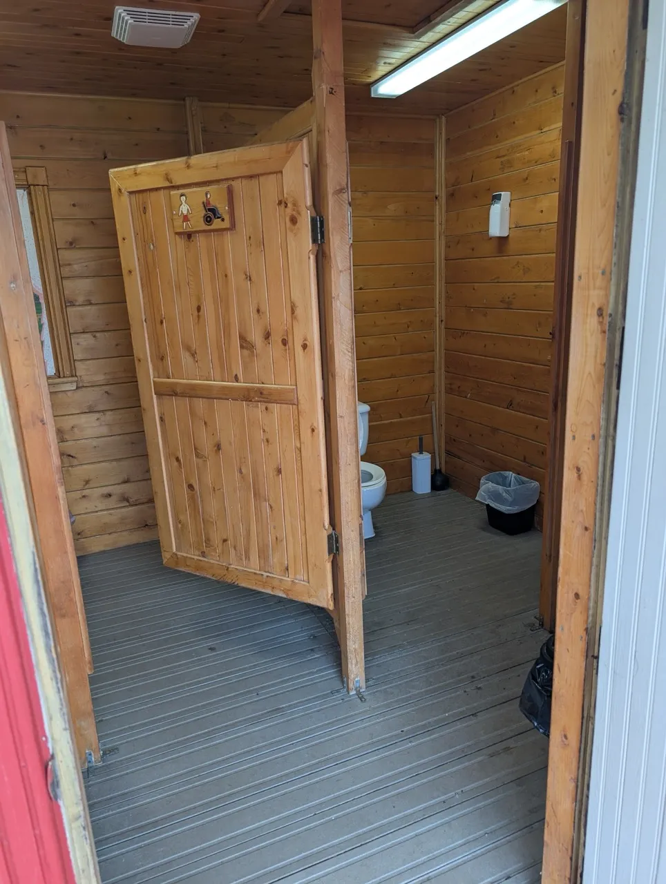 Interior of the building with 2 restroom stalls