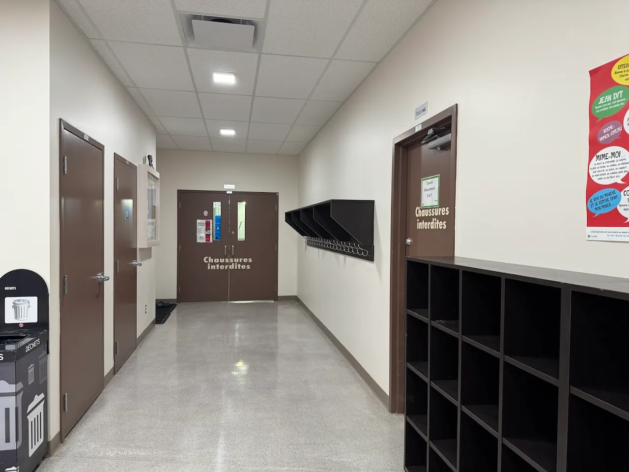 Hallway leading to the locker rooms and the pool