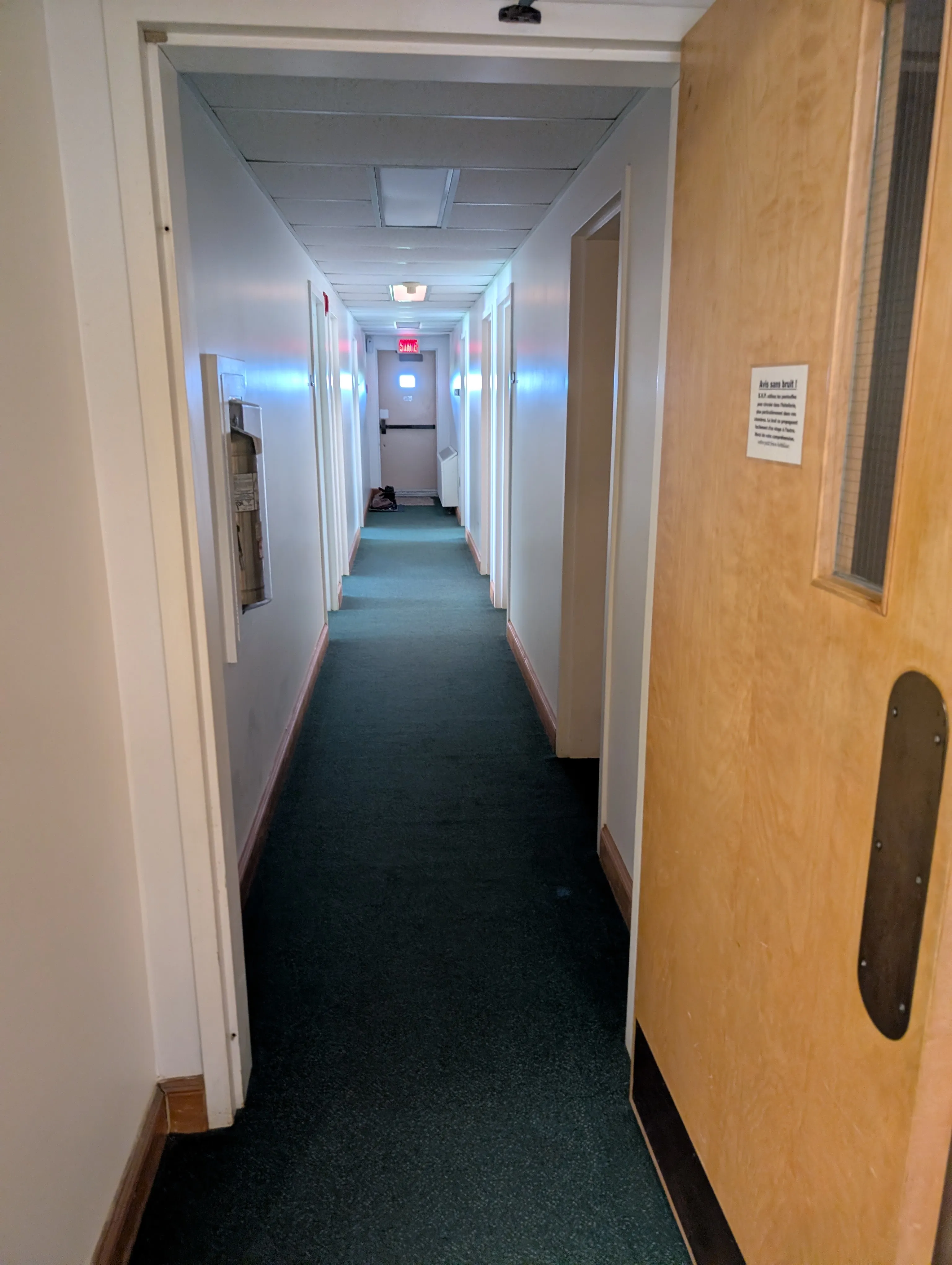 Hallway leading to the men's rooms